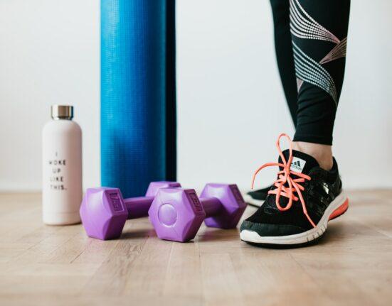 Well-organized home gym setup with essential fitness equipment