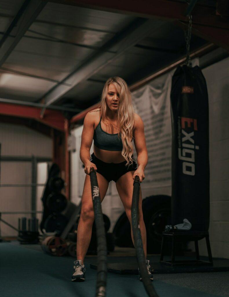 woman in black sports bra and black shorts